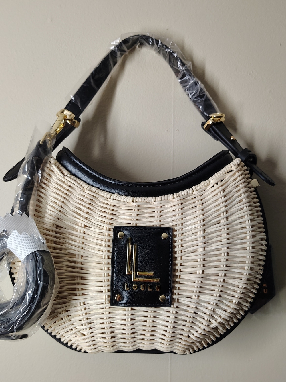 LOULU Crescent Woven Shoulder Bag in Cream and Black